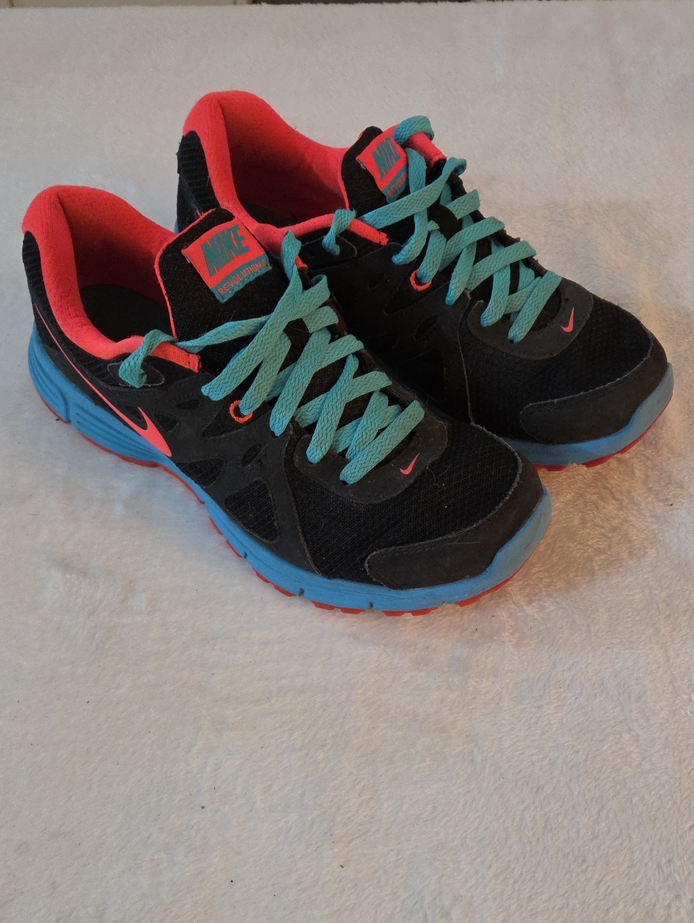 Nike Revolution2 Black Sneakers with Teal Laces and Coral Accents